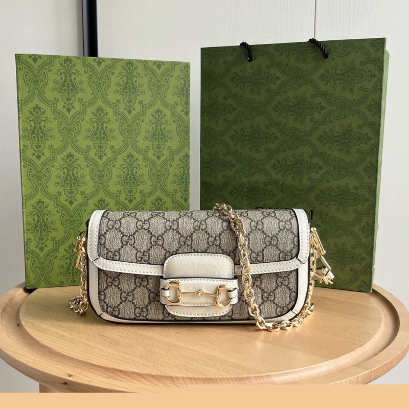 G*u*i satchel bags